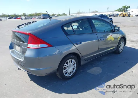 2011 Honda Insight from USA, damaged, VIN JHMZE2H32BS003362